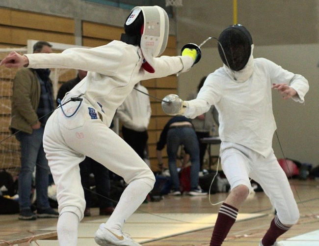 2 fencing members mid match